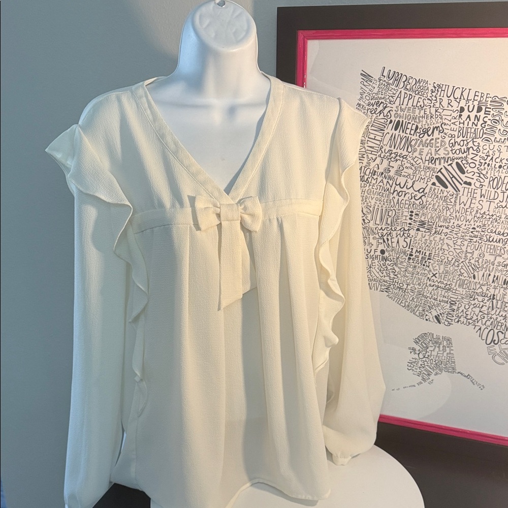 Cece Size Small like new Elegant Cream Blouse with Ruffle Details